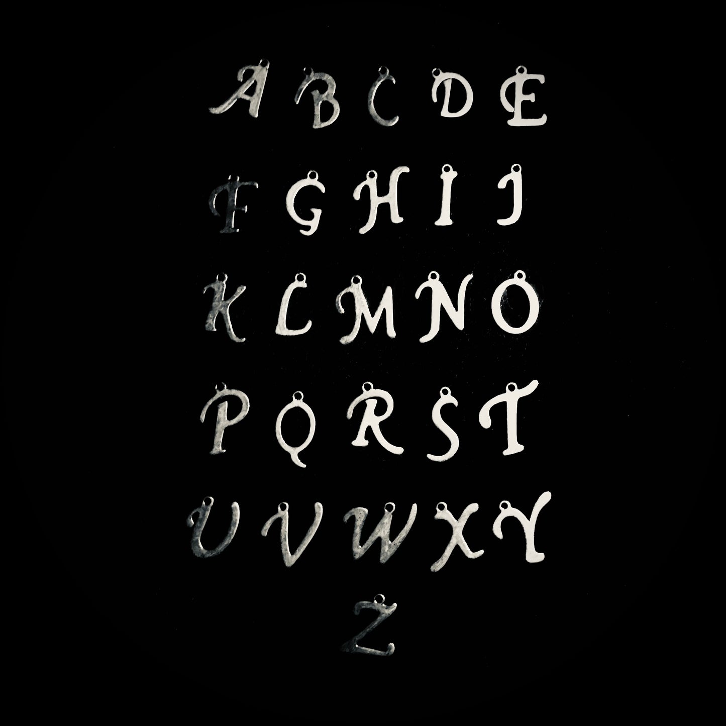 iTOTEM LETTERS IN SILVER STAINLESS STEEL