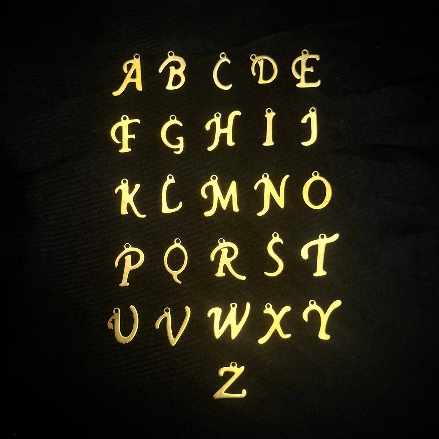 iTOTEM LETTERS IN 18K GOLD PLATED STAINLESS STEEL